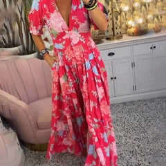 Robe florale vibrante Floriana, portée en situation – Valloro Paris