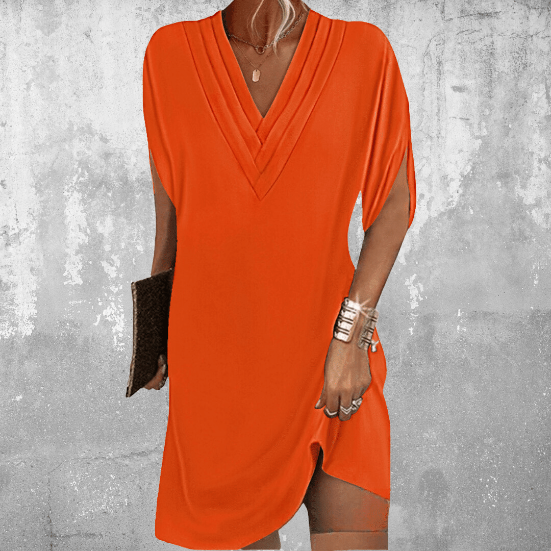 Robe élégante couverte du ventre Minetta, gros plan sur la coupe – Valloro Paris