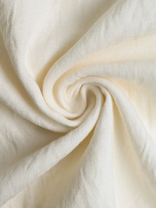 Robe smockée à bretelles nouées Honorine, vue de profil – Valloro Paris