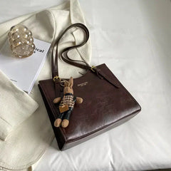 Sac à main compact et élégant Nora, vue de profil – Valloro Paris