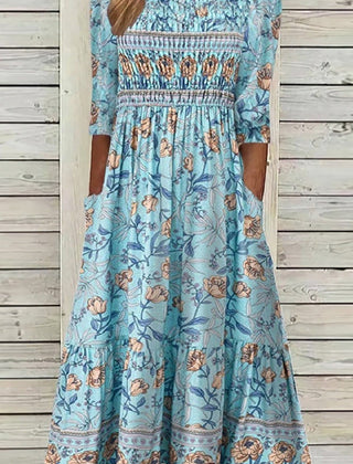 Robe fluide à imprimé pétales Aphra, vue de face – Valloro Paris