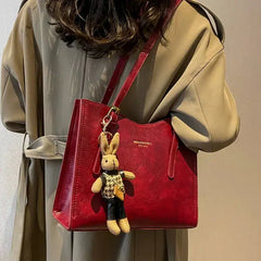 Sac à main compact et élégant Nora, détail des anses – Valloro Paris