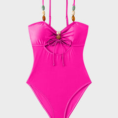 Maillot de bain satiné à perles et découpes Salomé, portée à la plage (photo 15) – Valloro Paris