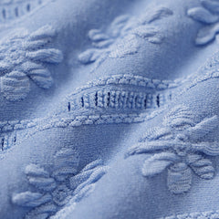 Bikini triangle bleu à imprimé floral Violette, présentation du coloris – Valloro Paris